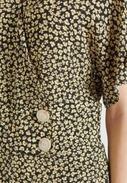 Khujo Borgia - Jumpsuit - Schwarz-Gelb Geblümt -Dameskledingwinkel af379724558d423ab9f19f8031bf325d