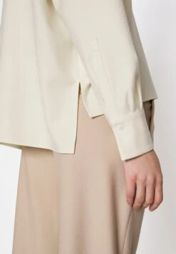 DRYKORN Cloelia - Blouse -Off White -Dameskledingwinkel c4bc0ca4918e496bb3b6ecbcc1751693